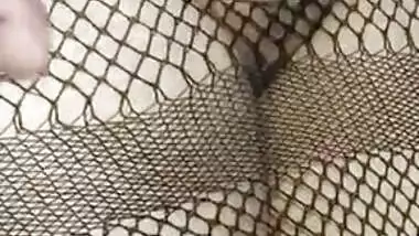Hot Desi babe in fishnet dress has her pussy XXX rubbed by lover